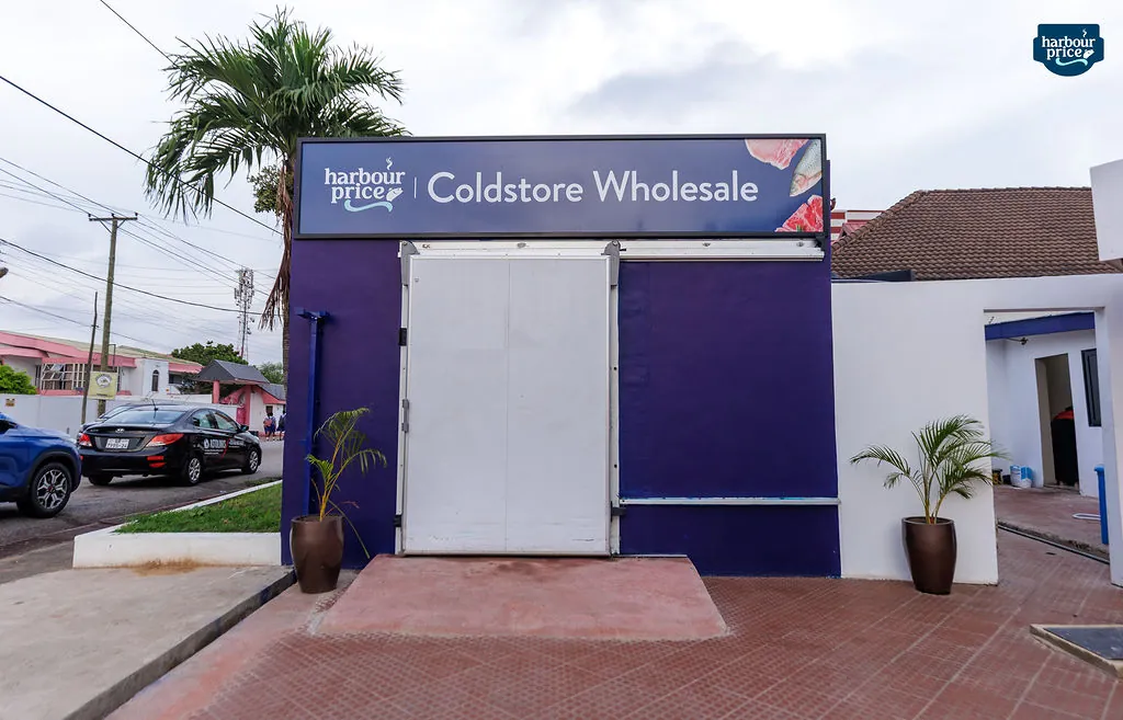 The purple Coldstore Wholesale entrance with its sign above the door