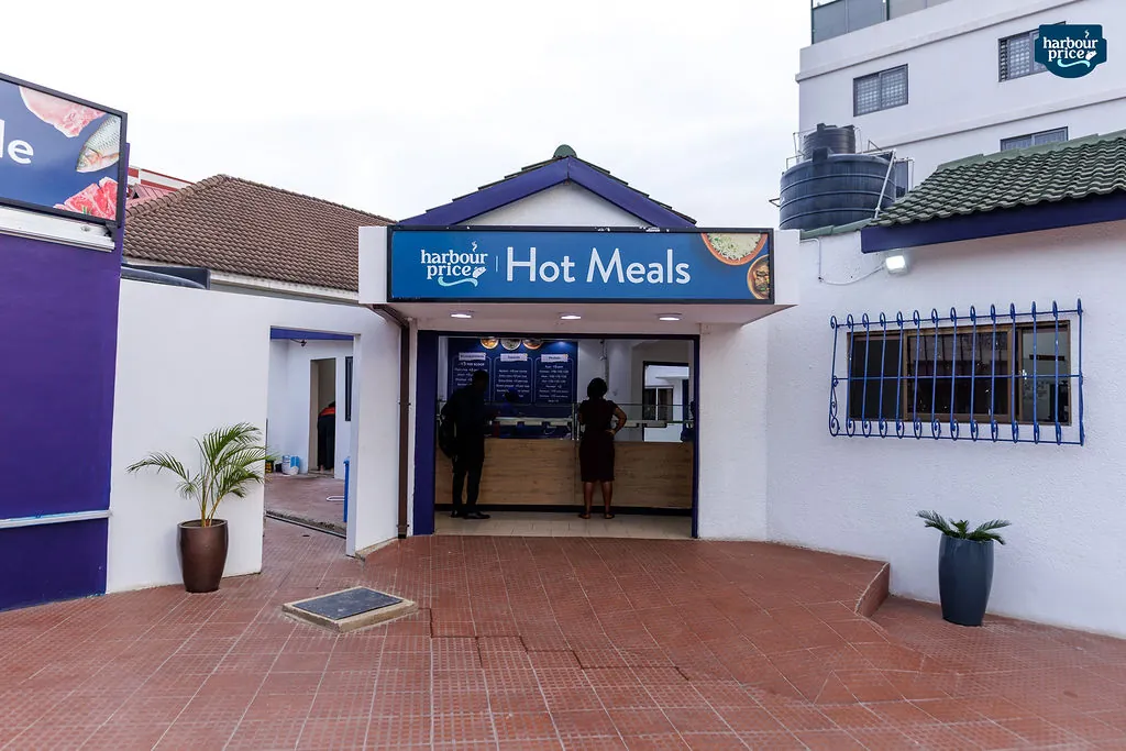 The Hot Meals counter entrance under its blue sign